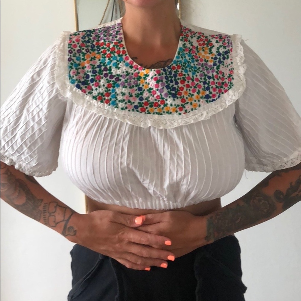Embroidered cropped peasant top.